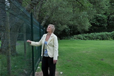 Veronica inspects the new fence